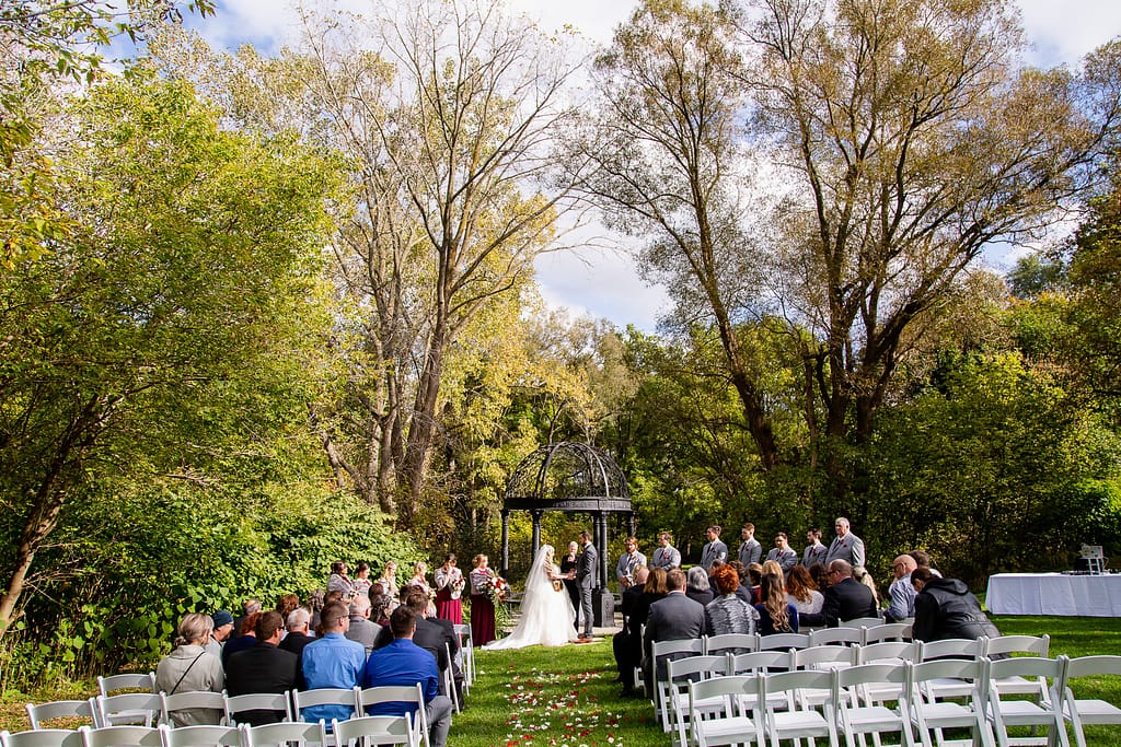 outdoor ceremony Elm Hurst wedding photography by london ontario photographer Woodgate Photography