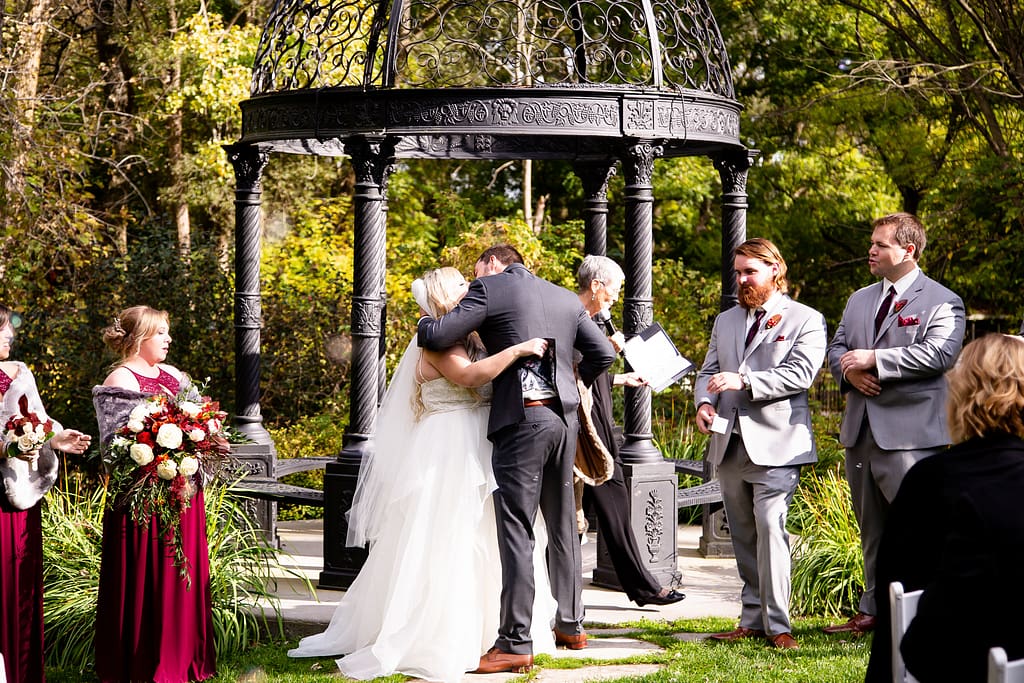 first kiss Elm Hurst wedding photography by london ontario photographer Woodgate Photography