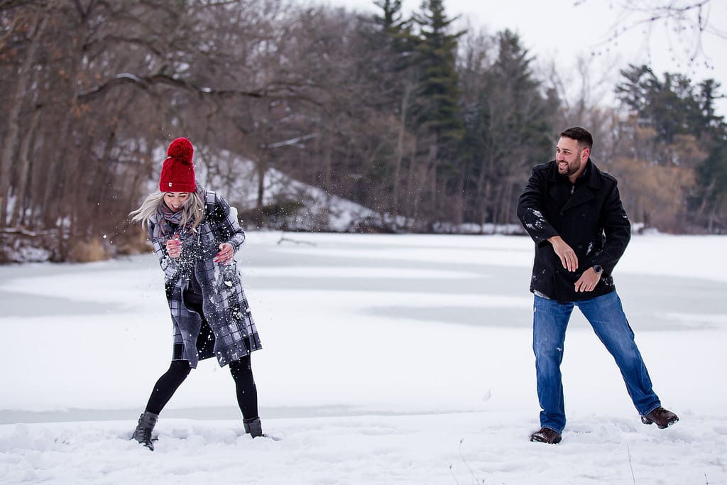 Winter engagement mill pond snow ball fight