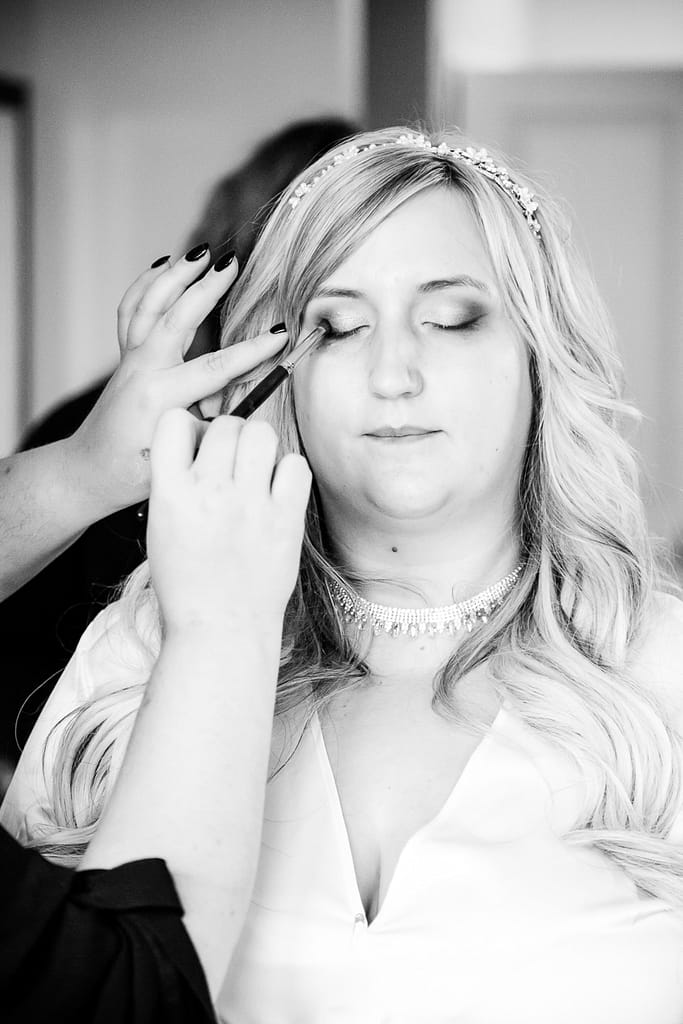 bride getting makeup Elm Hurst wedding photography by london ontario photographer Woodgate Photography